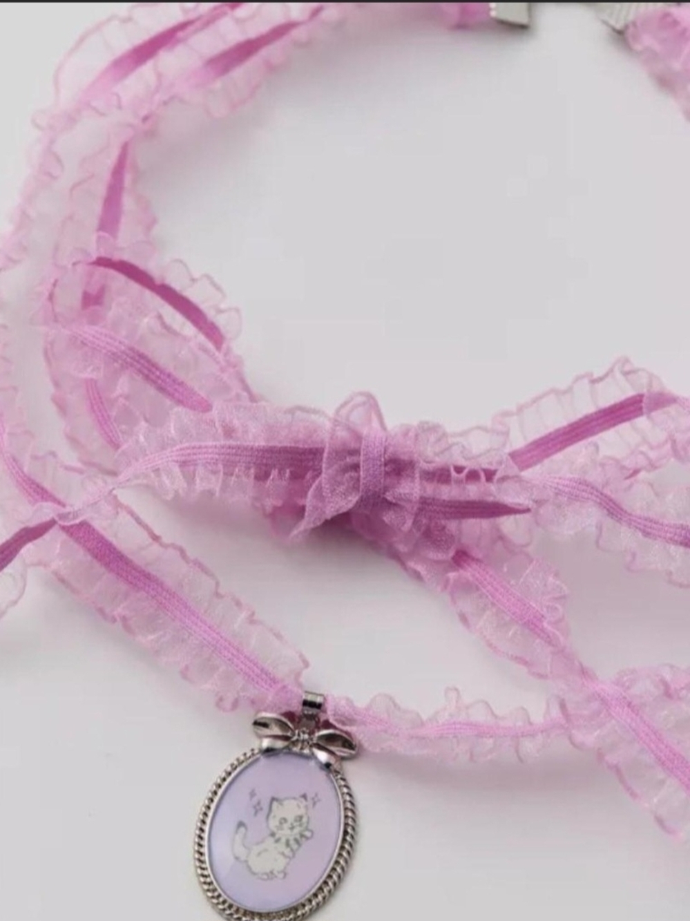 Urban Outfitters Pink Ruffled Ribbon Necklace with Cat Pendant